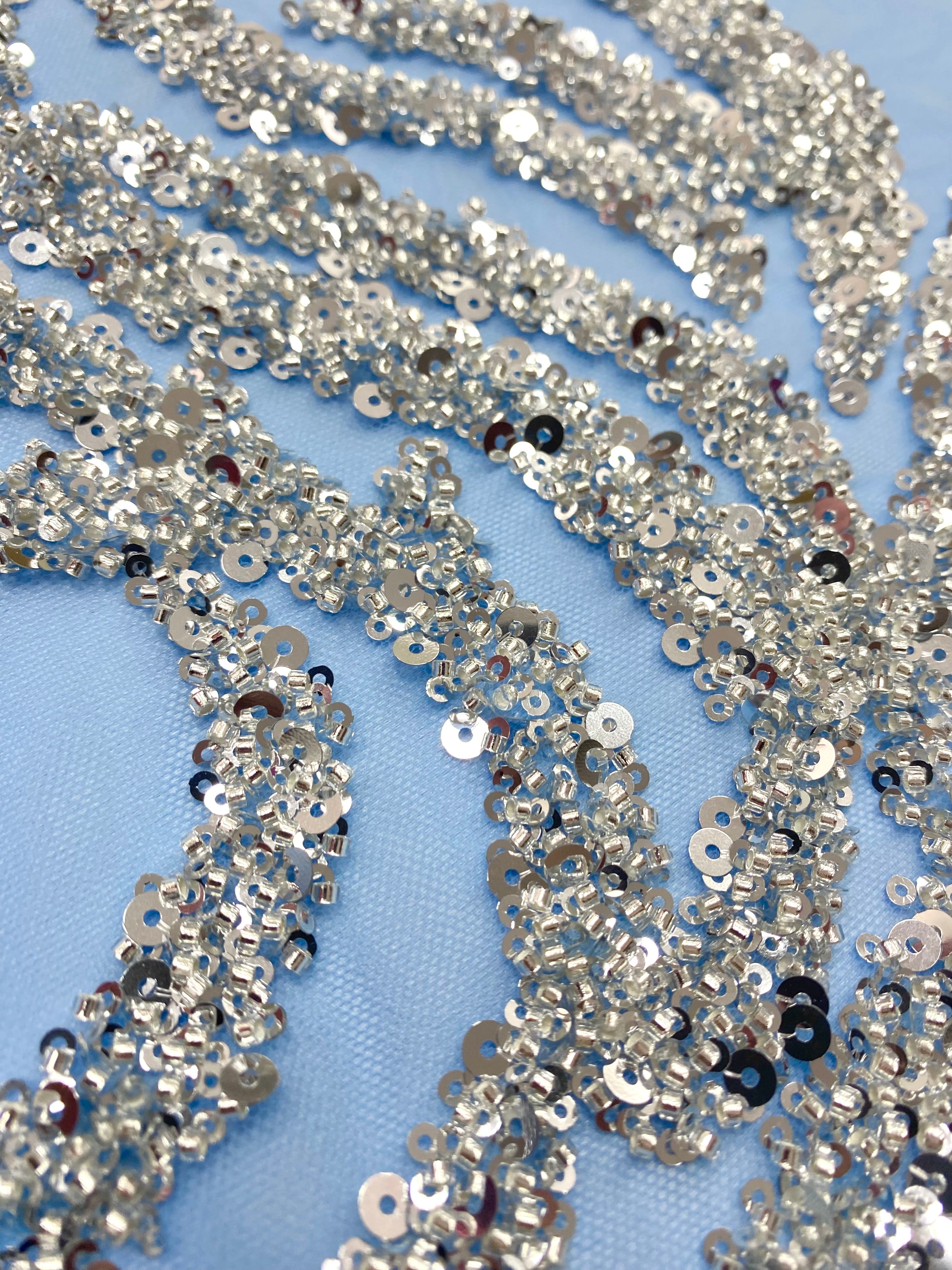 Silver Couture Lace on Blue Tulle, with Symmetrical Pattern, with Beads and Sequins 